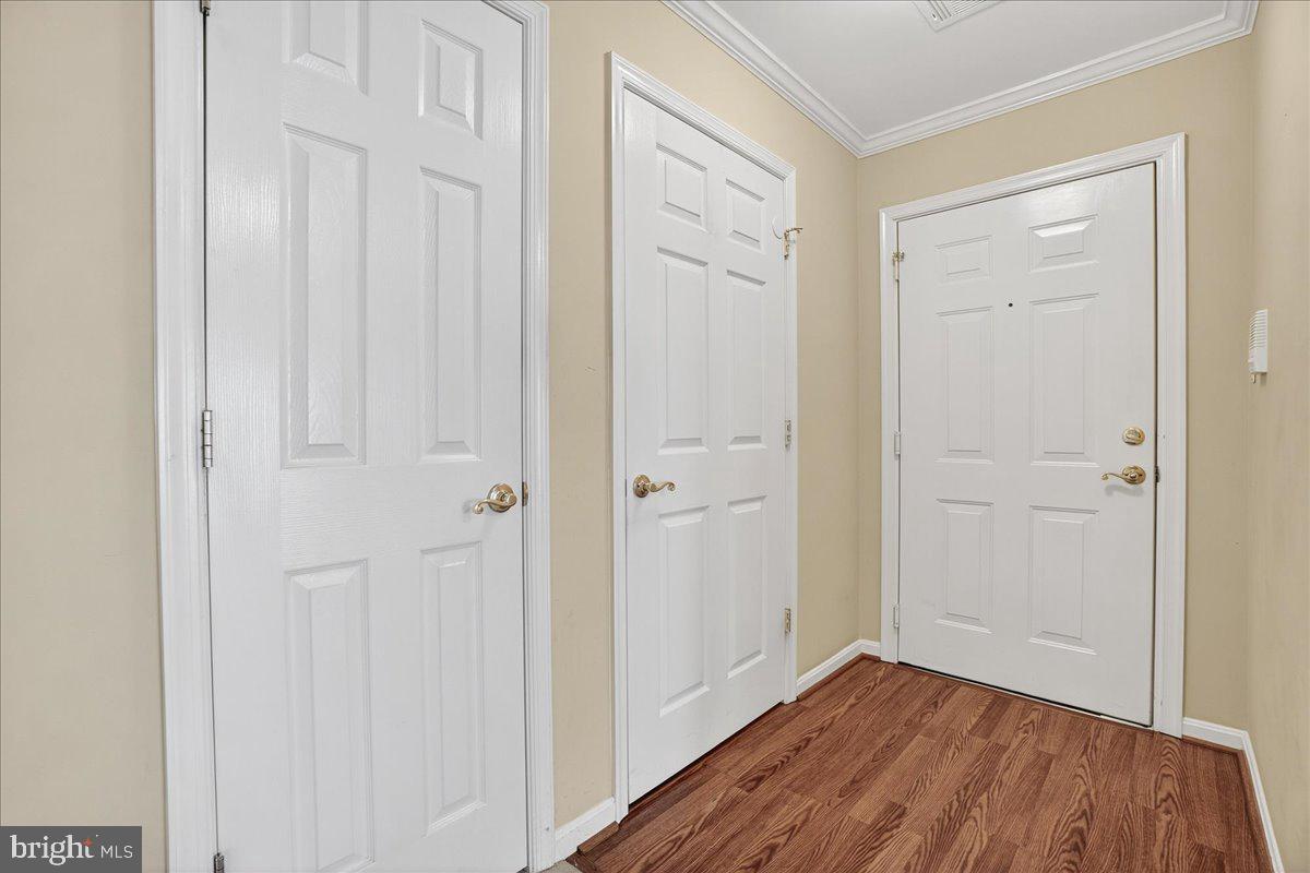 2509 Shelley Circle, Unit 5 3A Frederick, MD 21702 - Photo 8 of 47 a view of a hallway with wooden floor