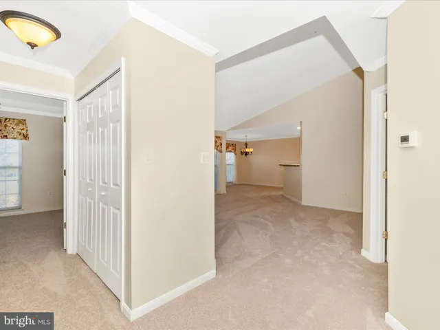 a view of a room with a hallway