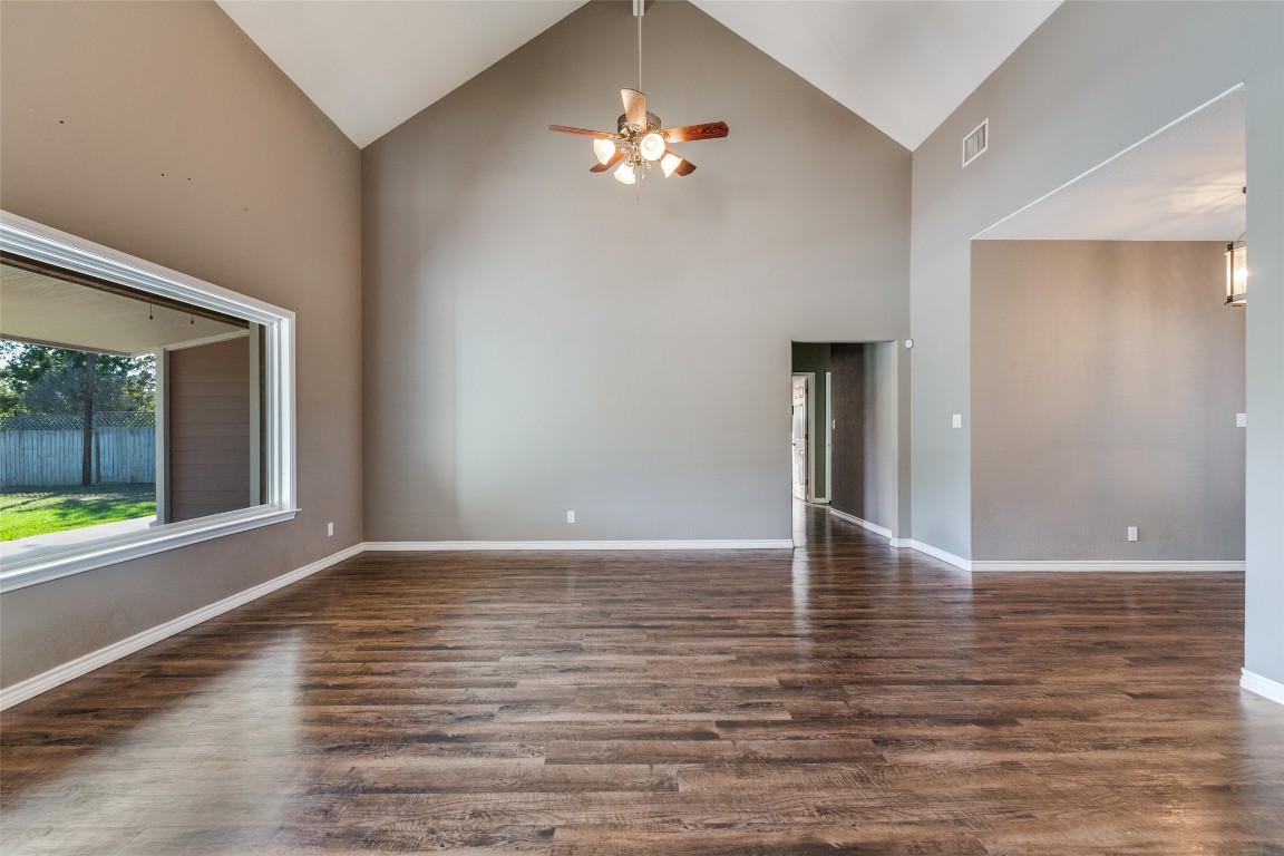 1536 Kings Ranch Road Bandera, TX 78003 - Photo 11 of 35 a view of an empty room with window and wooden floor
