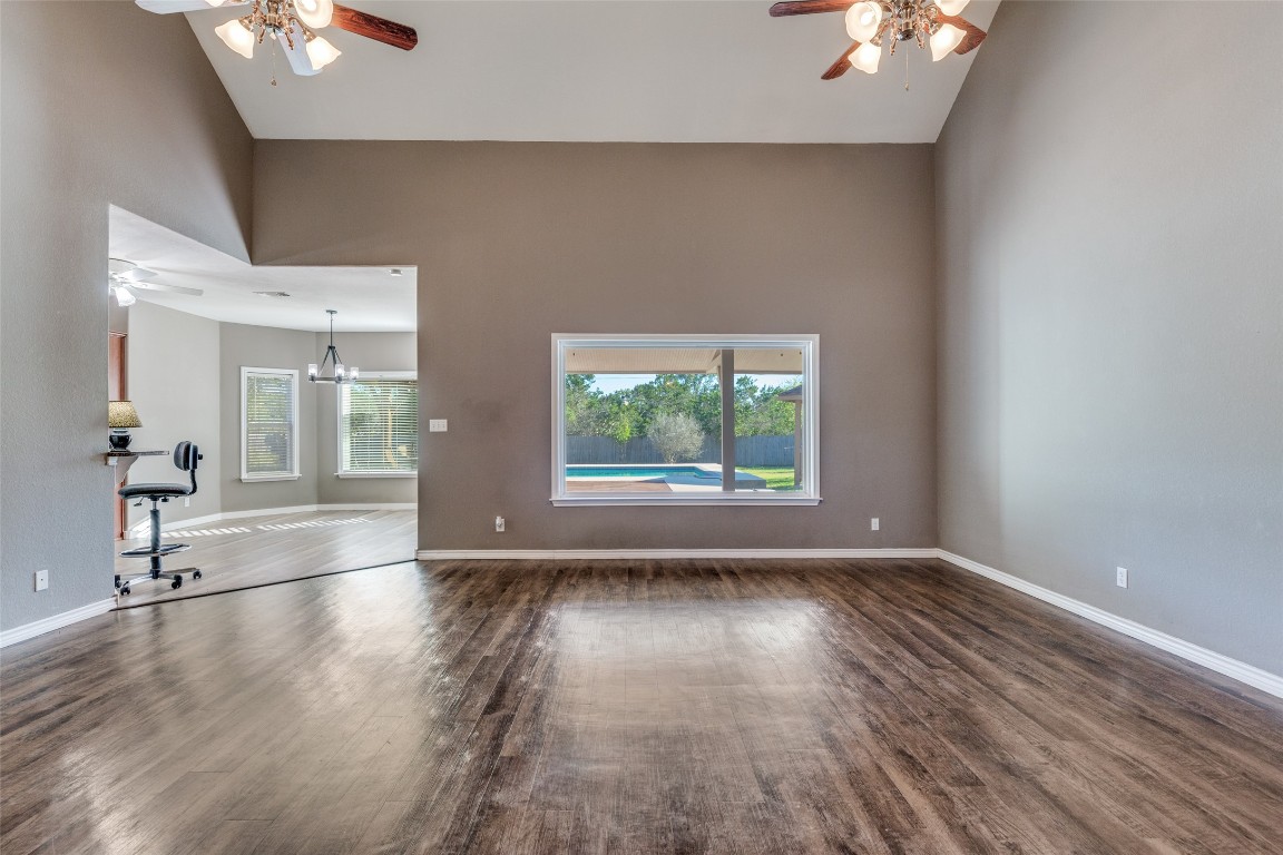 1536 Kings Ranch Road Bandera, TX 78003 - Photo 15 of 35 wooden floor in an empty room with a window