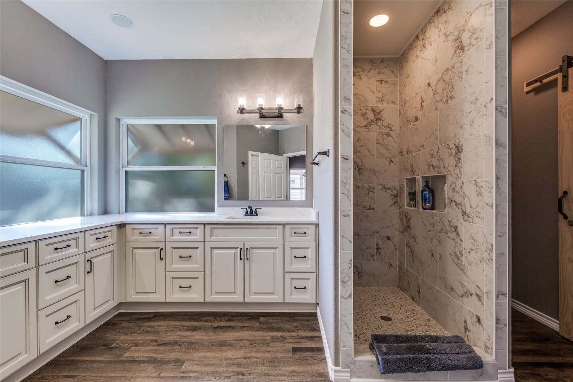 1536 Kings Ranch Road Bandera, TX 78003 - Photo 21 of 35 a spacious bathroom with a shower and a sink