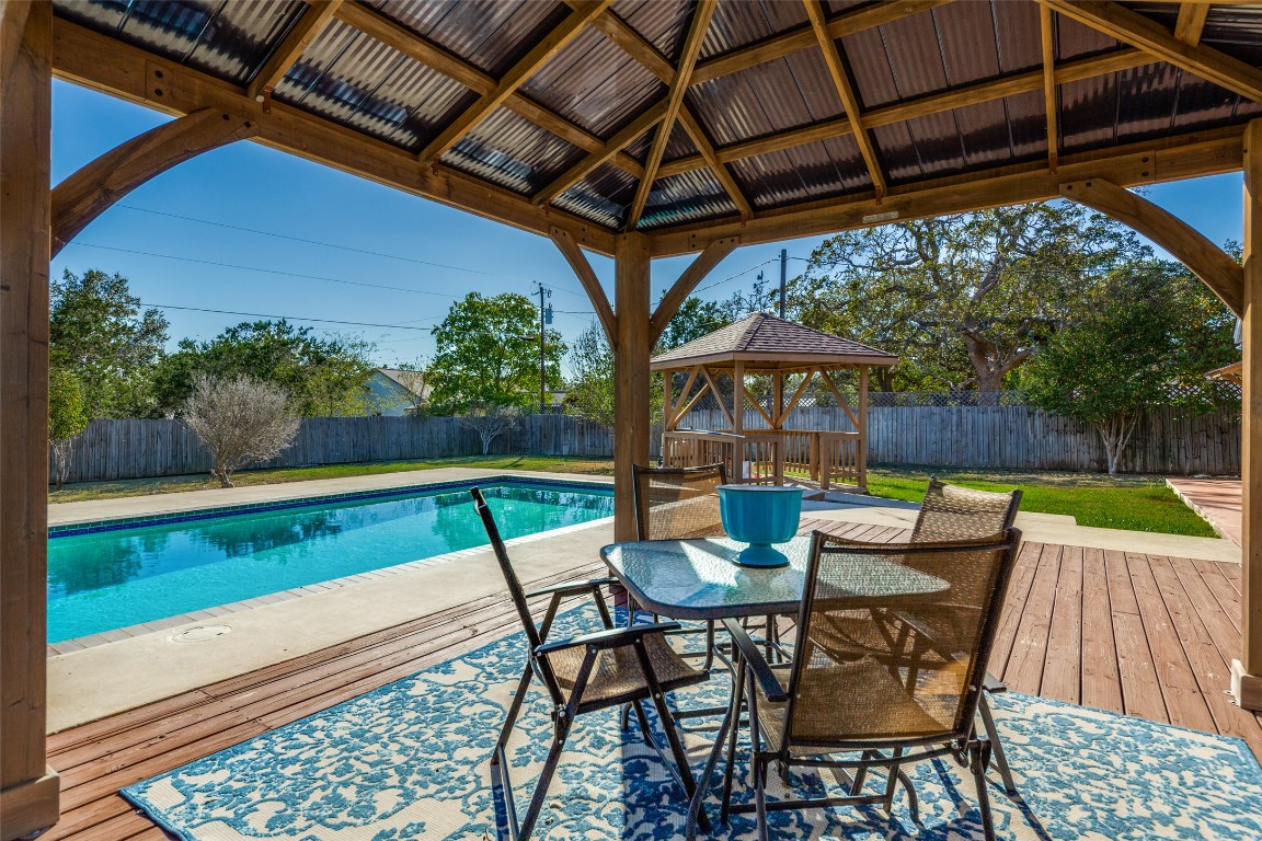 1536 Kings Ranch Road Bandera, TX 78003 - Photo 27 of 35 a view of chairs and table in the patio