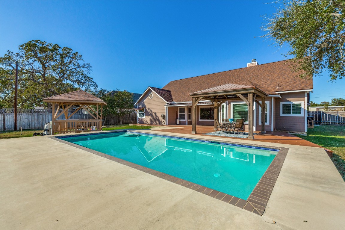 1536 Kings Ranch Road Bandera, TX 78003 - Photo 28 of 35 a front view of house with yard and swimming pool