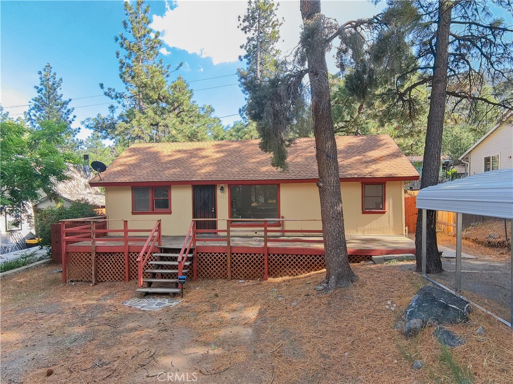 1777 Sparrow Road Wrightwood, CA 92397 - Photo 33 of 44 a view of a house with backyard and sitting area