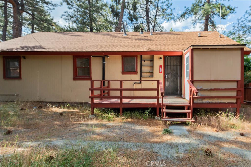 1777 Sparrow Road Wrightwood, CA 92397 - Photo 34 of 44 a front view of a house with a garden