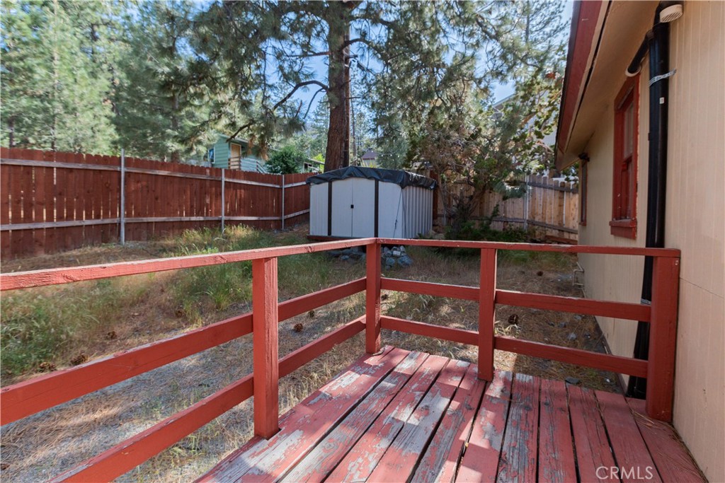 1777 Sparrow Road Wrightwood, CA 92397 - Photo 37 of 44 a view of backyard with wooden floor and fence