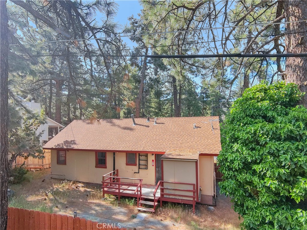 1777 Sparrow Road Wrightwood, CA 92397 - Photo 41 of 44 a view of a house with a yard and sitting area