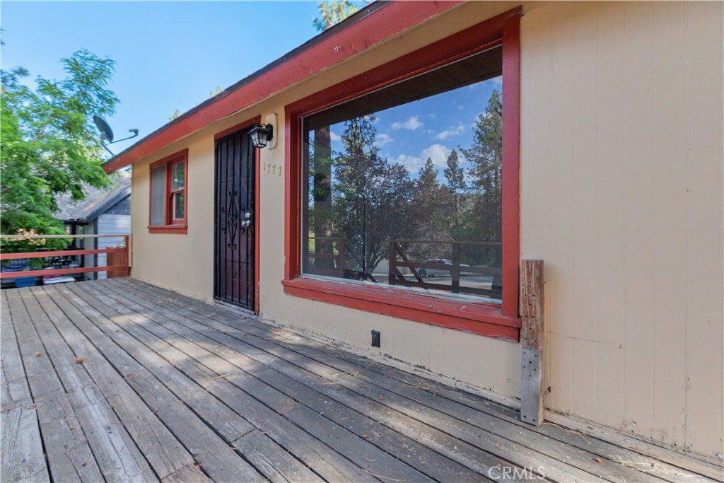 1777 Sparrow Road Wrightwood, CA 92397 - Photo 5 of 44 a view of a two chairs in the balcony