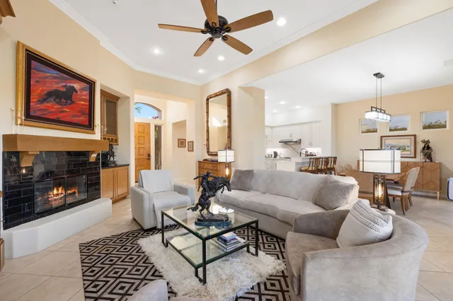 a view of living room with granite countertop furniture and fireplace
