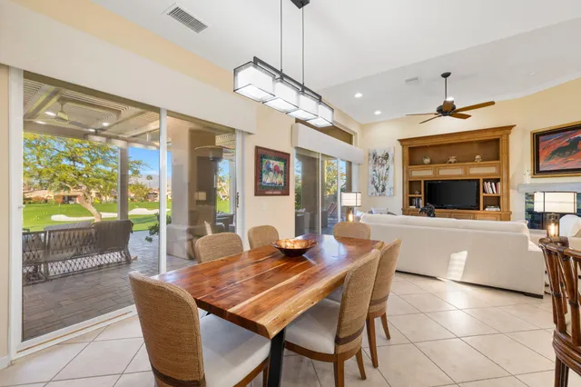 a spacious bedroom with a bed and a couch