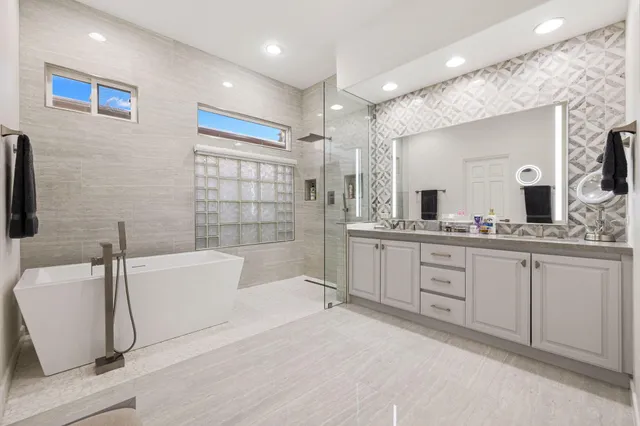 a bedroom with bed and window