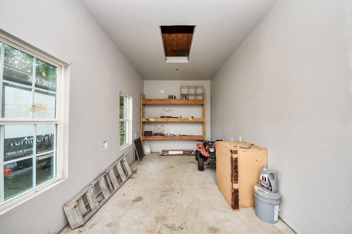 2608 Bostic Street Houston, TX 77093 - Photo 12 of 37 a view of a storage & utility room with two windows