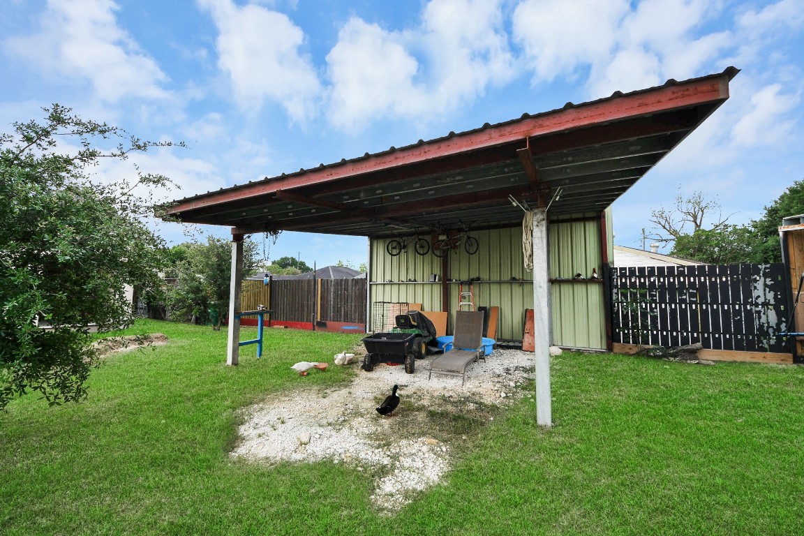 2608 Bostic Street Houston, TX 77093 - Photo 14 of 37 a backyard of a house with table and chairs
