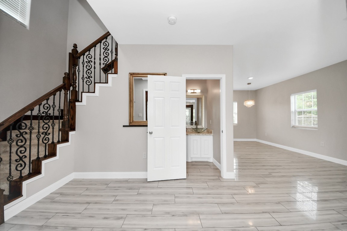 2608 Bostic Street Houston, TX 77093 - Photo 18 of 37 a view of entryway and hall with wooden floor