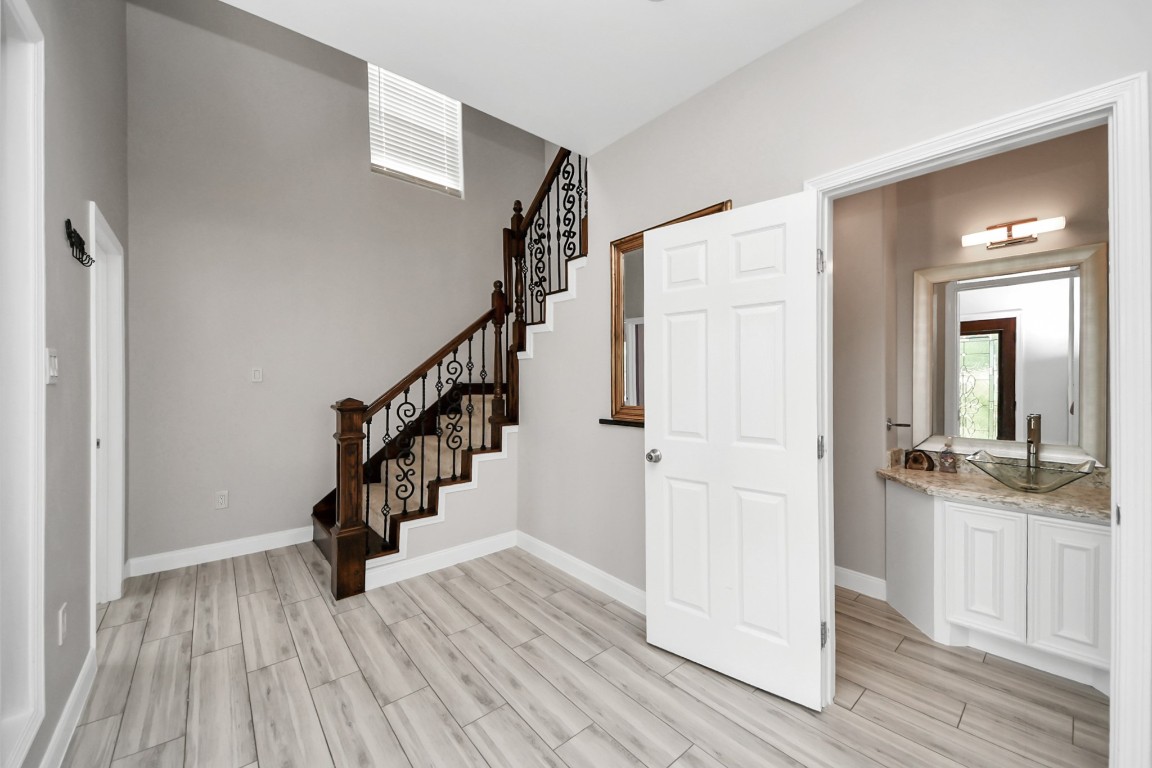 2608 Bostic Street Houston, TX 77093 - Photo 21 of 37 a view of entryway and hall with wooden floor