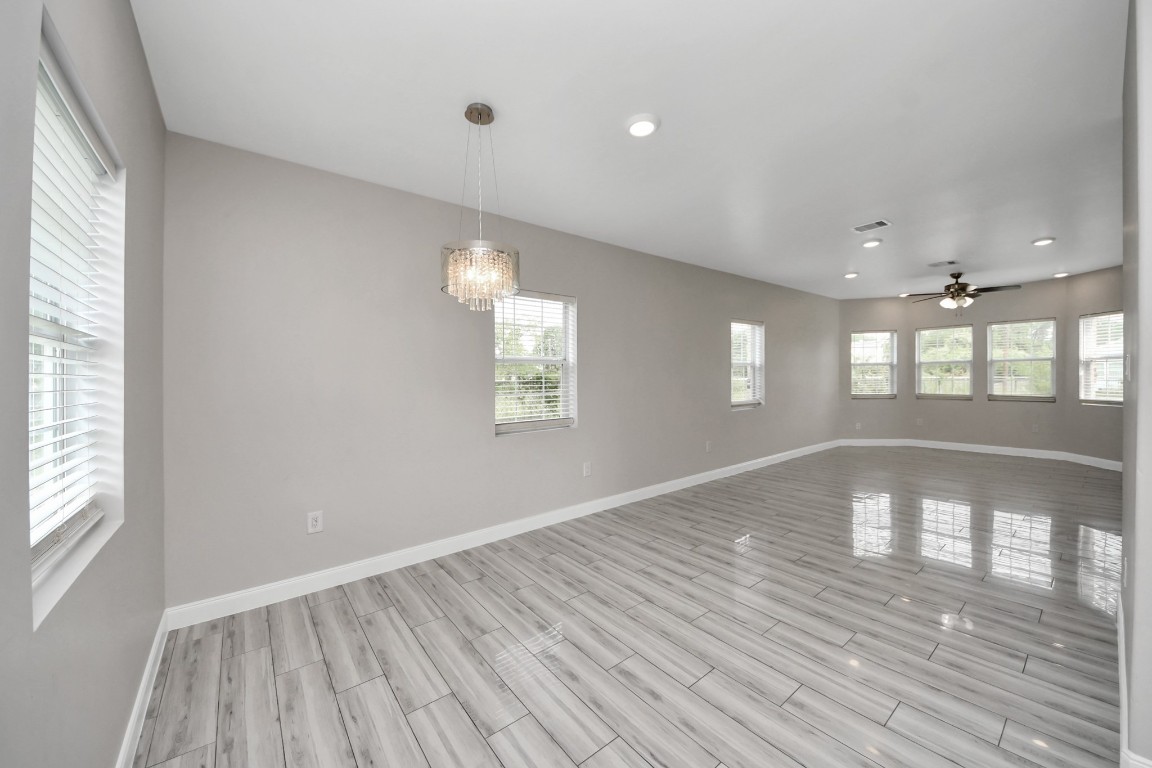 2608 Bostic Street Houston, TX 77093 - Photo 25 of 37 an empty room with wooden floor and windows