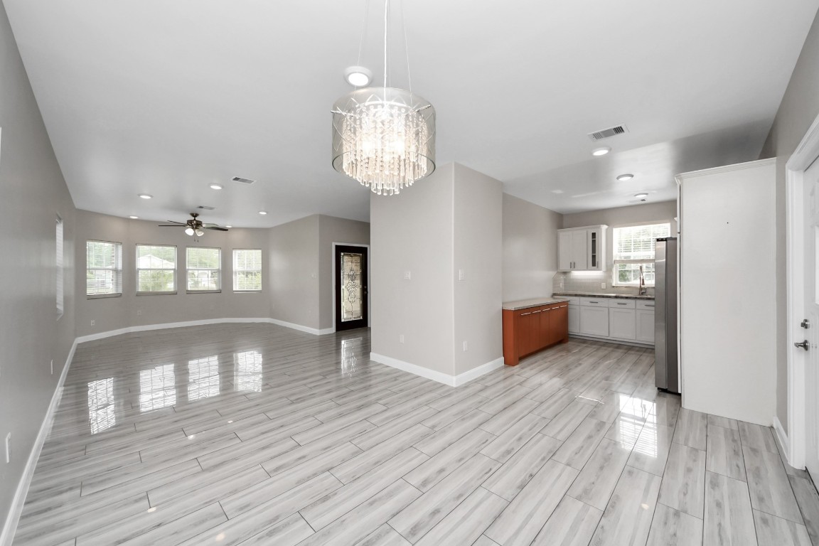 2608 Bostic Street Houston, TX 77093 - Photo 26 of 37 a view of empty room with wooden floor and window