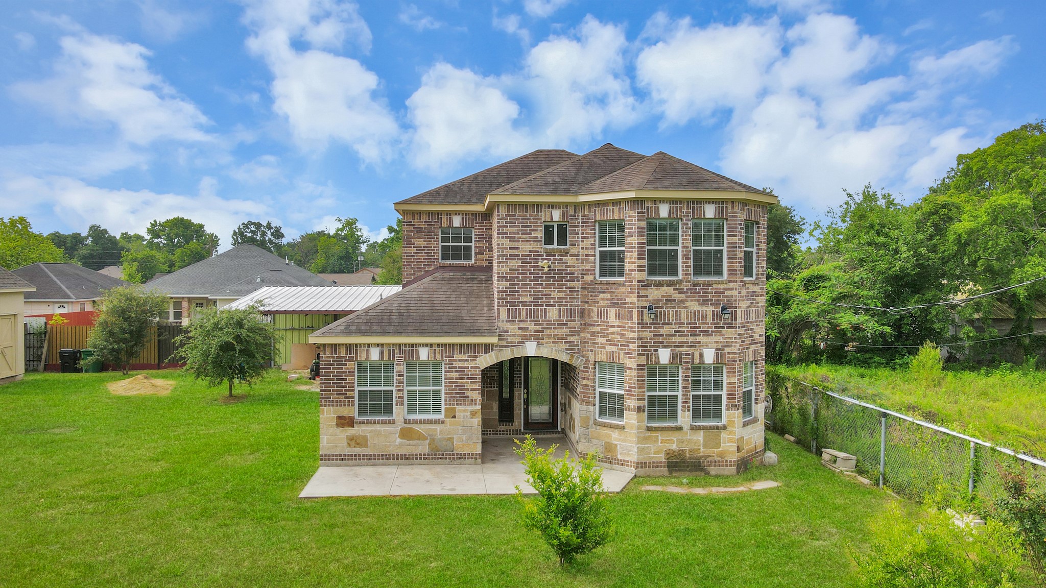 2608 Bostic Street Houston, TX 77093 - Photo 3 of 37 a front view of a house with a yard
