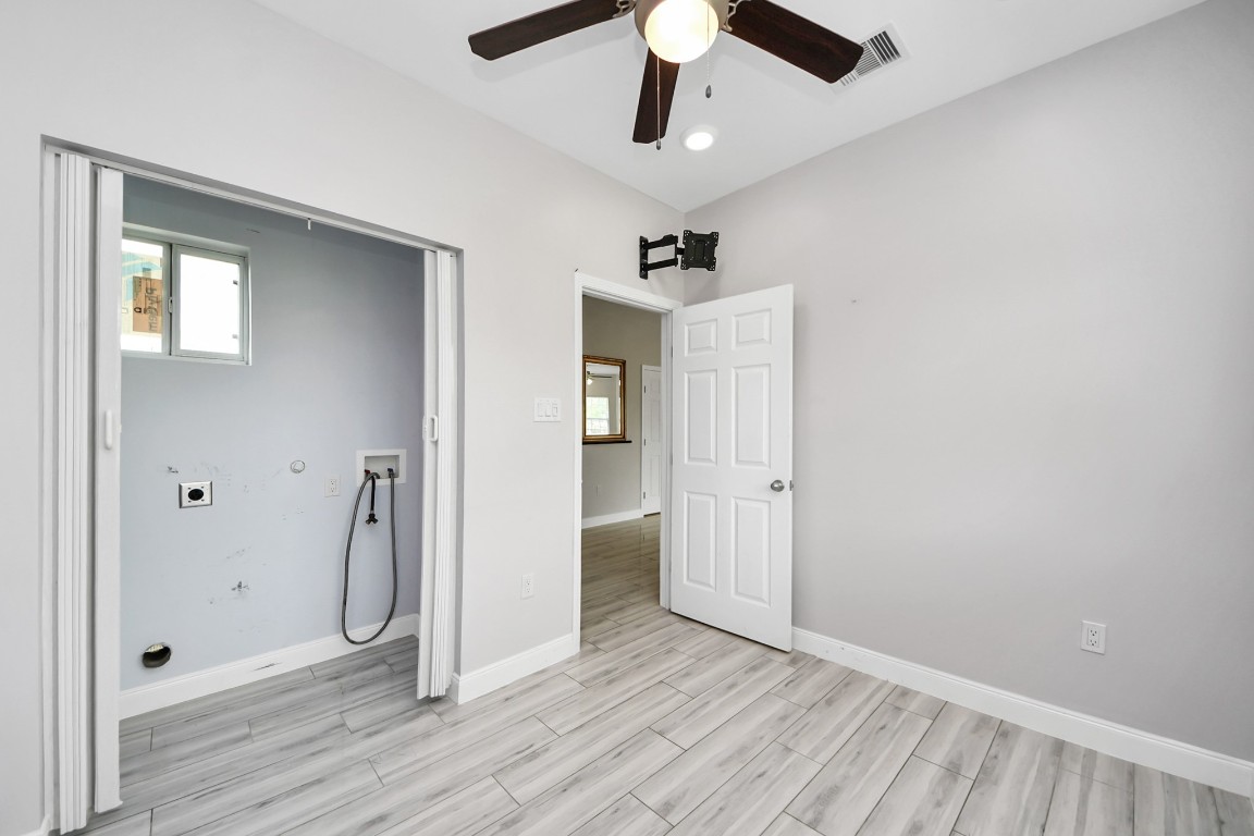 2608 Bostic Street Houston, TX 77093 - Photo 32 of 37 a view of an empty room with wooden floor