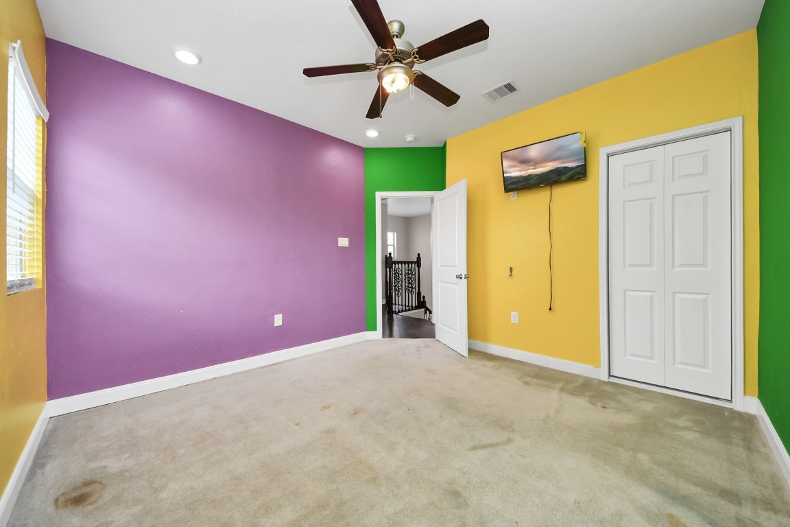 2608 Bostic Street Houston, TX 77093 - Photo 33 of 37 a view of a livingroom with a ceiling fan and window