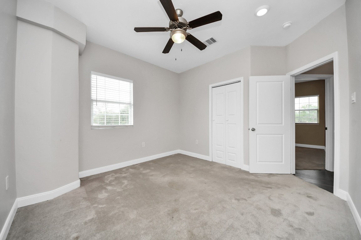 2608 Bostic Street Houston, TX 77093 - Photo 34 of 37 an empty room with fan and windows