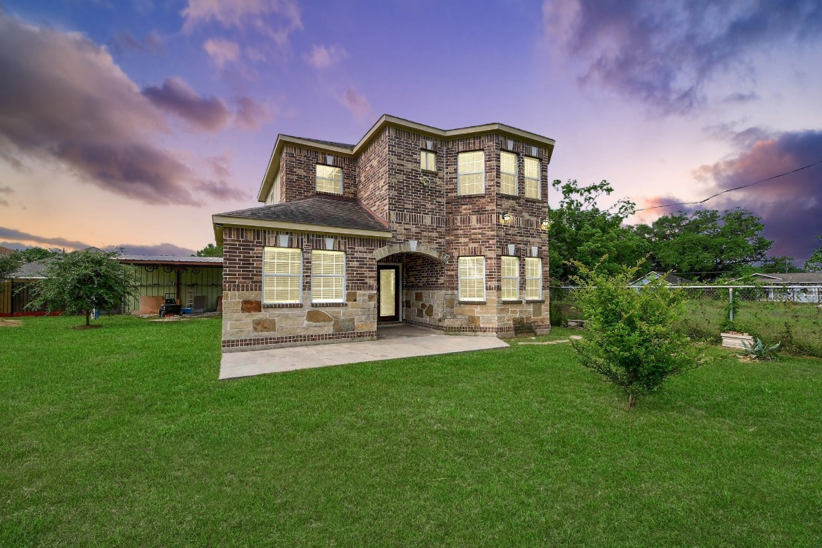 2608 Bostic Street Houston, TX 77093 - Photo 8 of 37 a front view of a house with garden