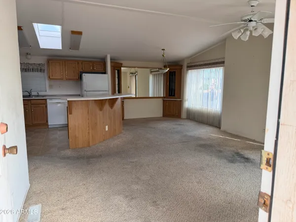 a view of a kitchen with a sink