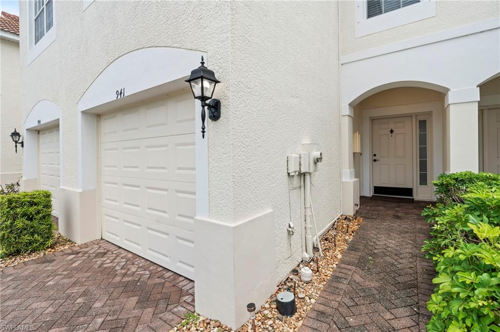 941 Hampton Circle, Unit 109 Naples, FL 34105 - Photo 6 of 27 a view of house with entryway