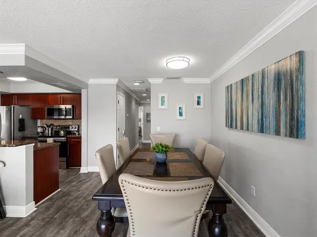 a view of a dining room with furniture