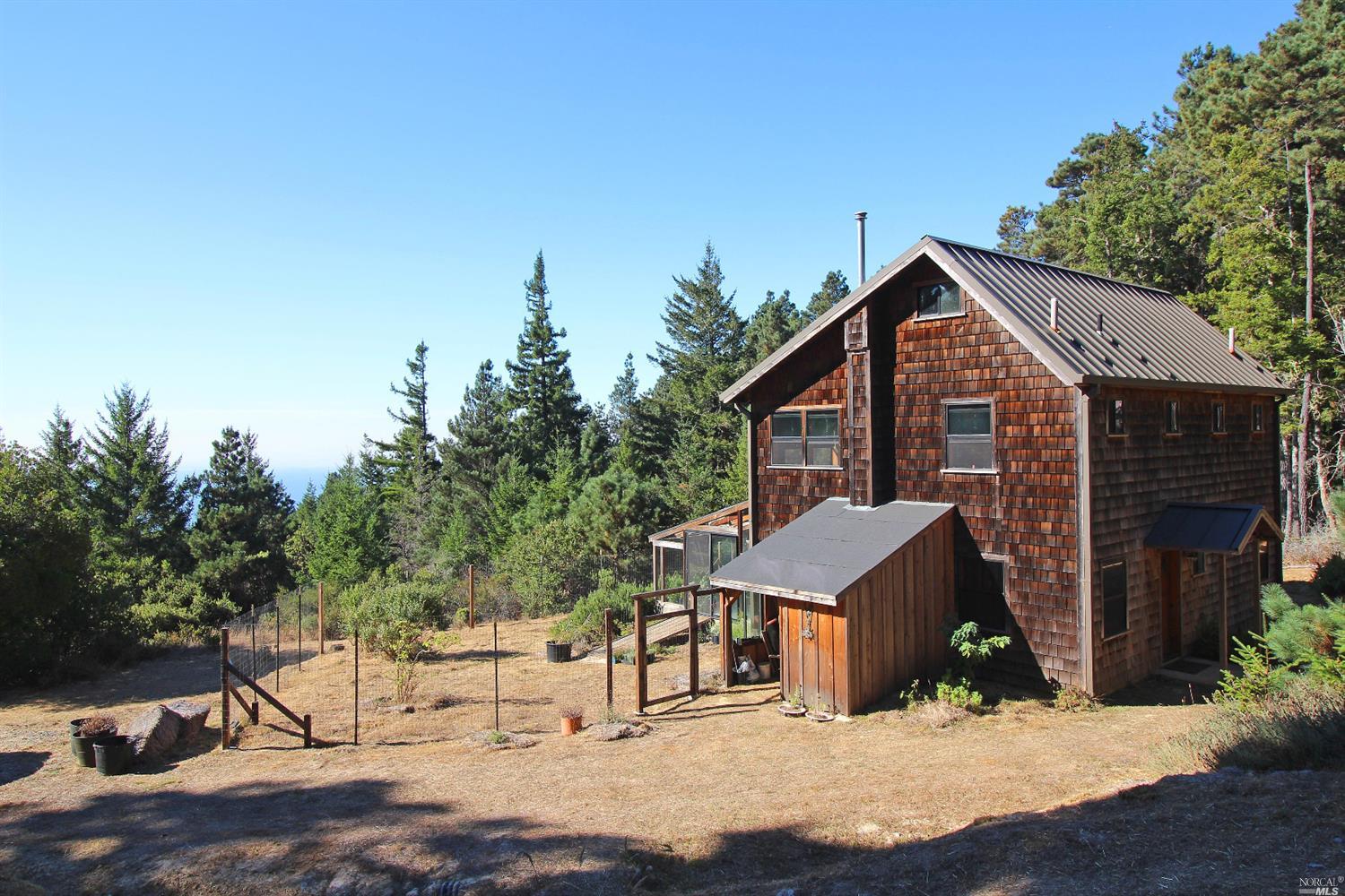 44736 Zettler Road Point Arena, CA 95468 - Photo 1 of 1 a view of a house with a yard