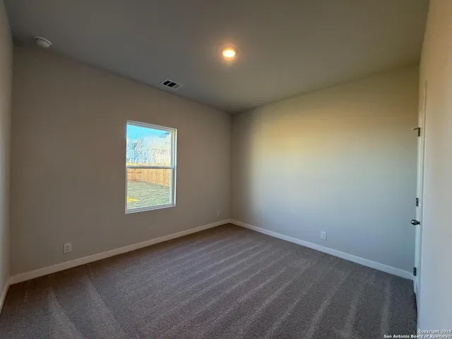 a bathroom with a double vanity sink toilet mirror and bathtub