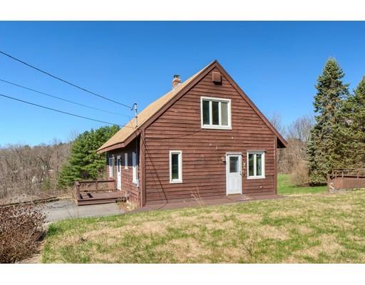 7 Ellis Road Southbridge, MA 01550 - Photo 2 of 30 a backyard of a house with garden
