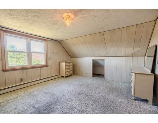 7 Ellis Road Southbridge, MA 01550 - Photo 22 of 30 a view of a livingroom with an empty space and a window