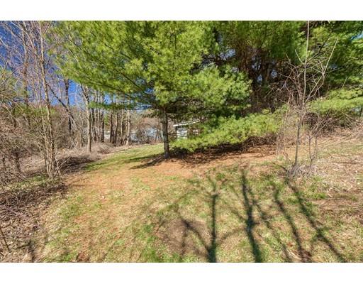 7 Ellis Road Southbridge, MA 01550 - Photo 30 of 30 a view of a yard with plants and large trees