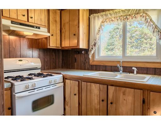 7 Ellis Road Southbridge, MA 01550 - Photo 9 of 30 a kitchen with appliances cabinets and a sink
