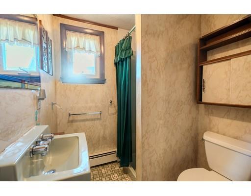 7 Ellis Road Southbridge, MA 01550 - Photo 10 of 30 a bathroom with a toilet sink and mirror