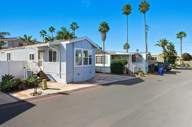 a view of a house with a street
