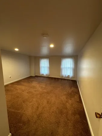 an empty room with windows