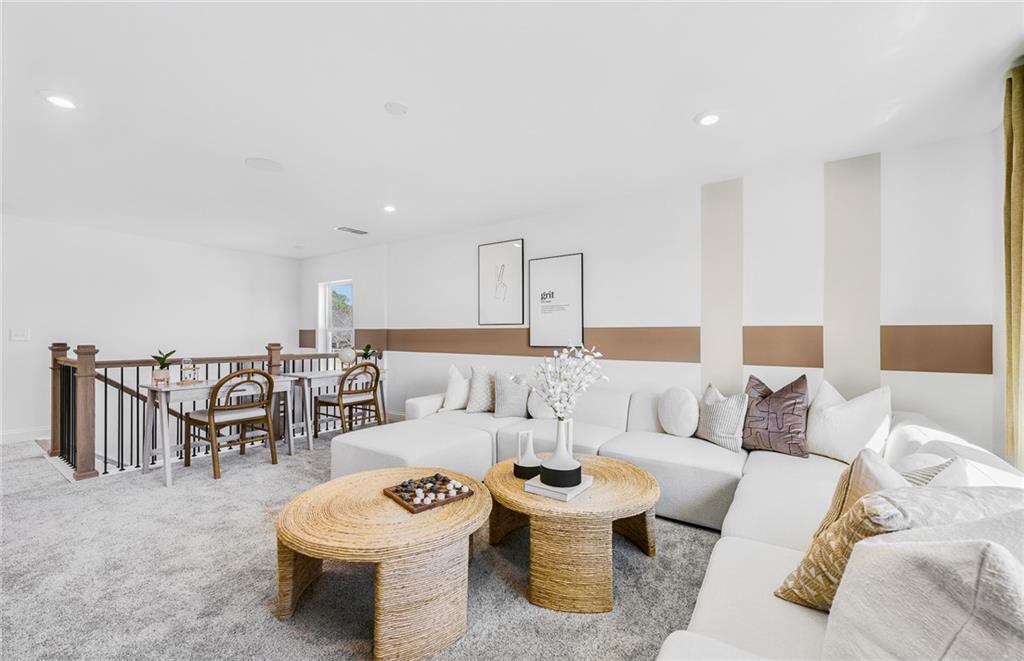2102 Cayman Court Dacula, GA 30019 - Photo 10 of 18 a living room with furniture and a table