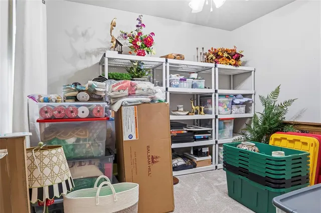 a bedroom with furniture a baby toys and a couch