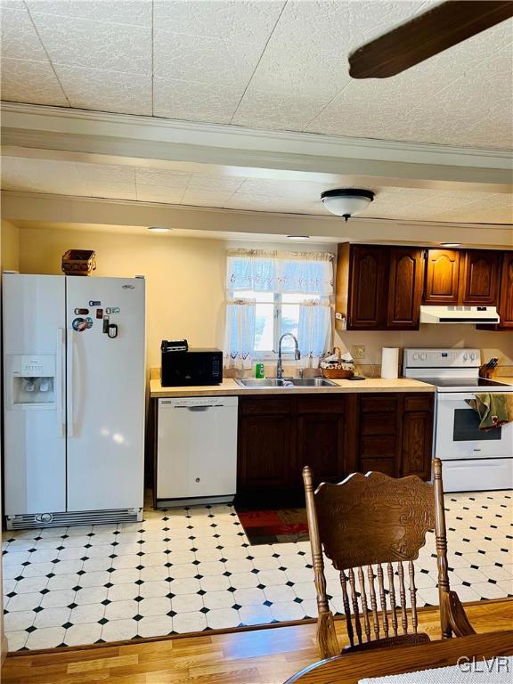 1466 Bushkill Center Road Nazareth, PA 18064 - Photo 7 of 26 a kitchen with granite countertop a refrigerator and a stove top oven