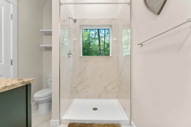 a bathroom with a bath tub