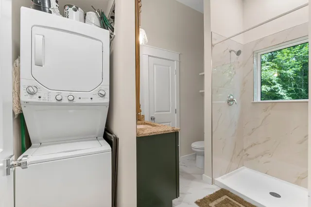 a bathroom with a toilet and a sink