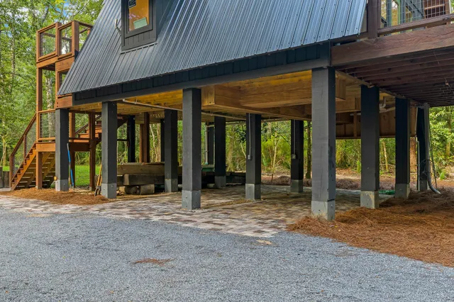 a view of a house with large windows