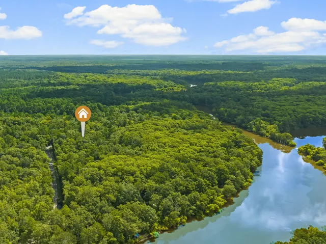 a view of a lake with a yard