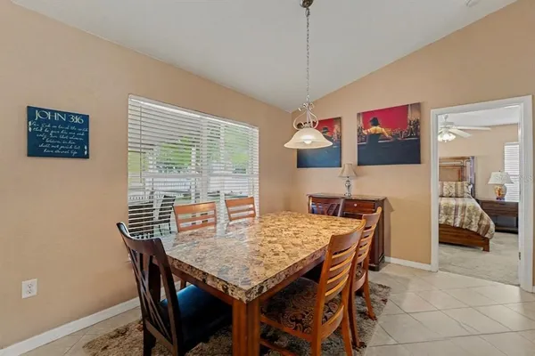 a view of a dining room with furniture