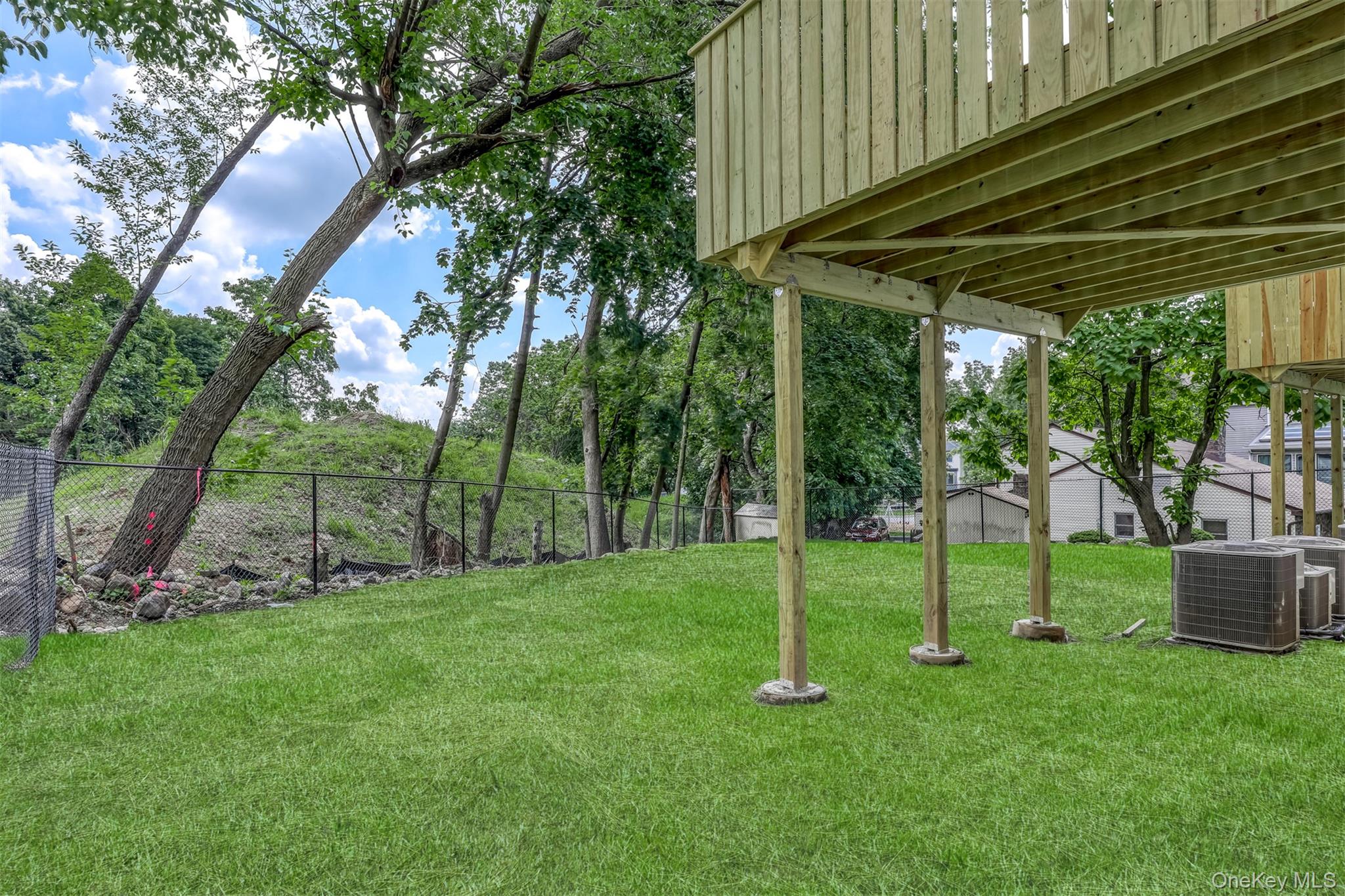 130 Union Road, Unit 201 Spring Valley, NY 10977 - Photo 22 of 47 a view of a backyard with small cabin