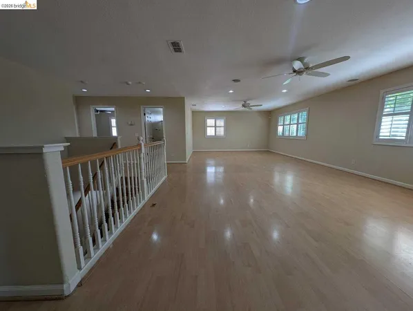 an entryway in a hall with a window