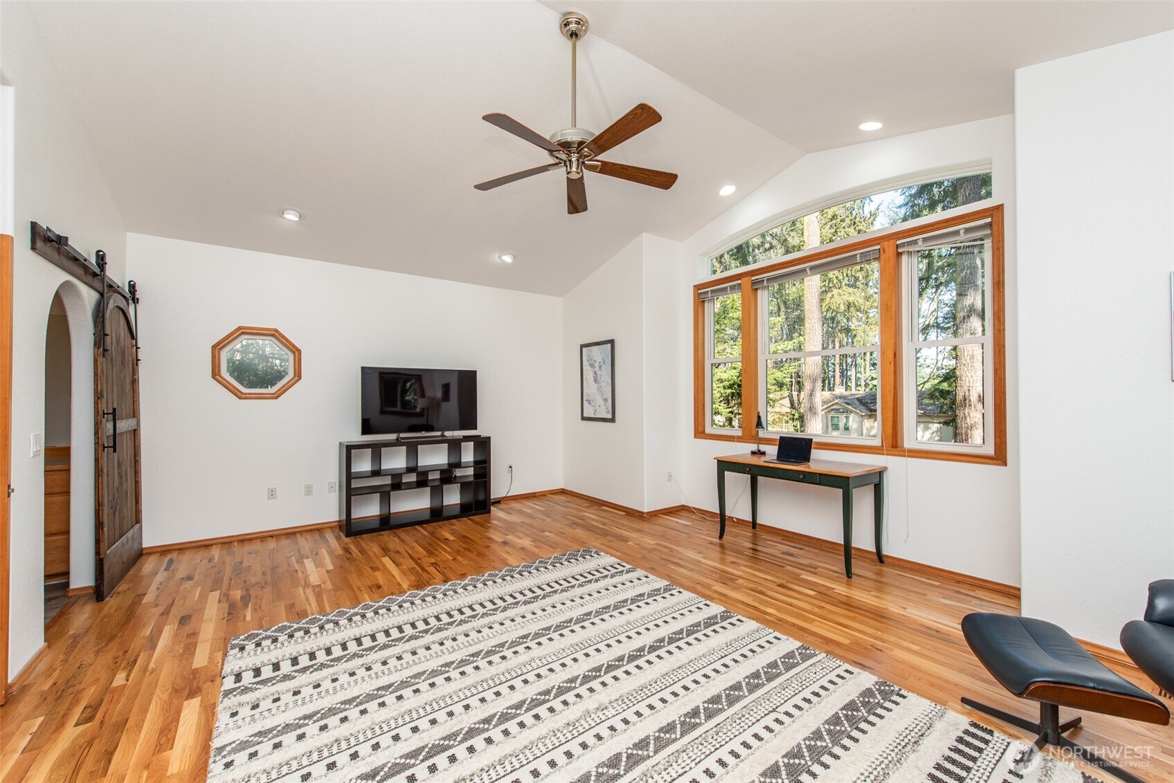 31 Josephine Place Sequim, WA 98382 - Photo 18 of 40 a living room with furniture and a wooden floor