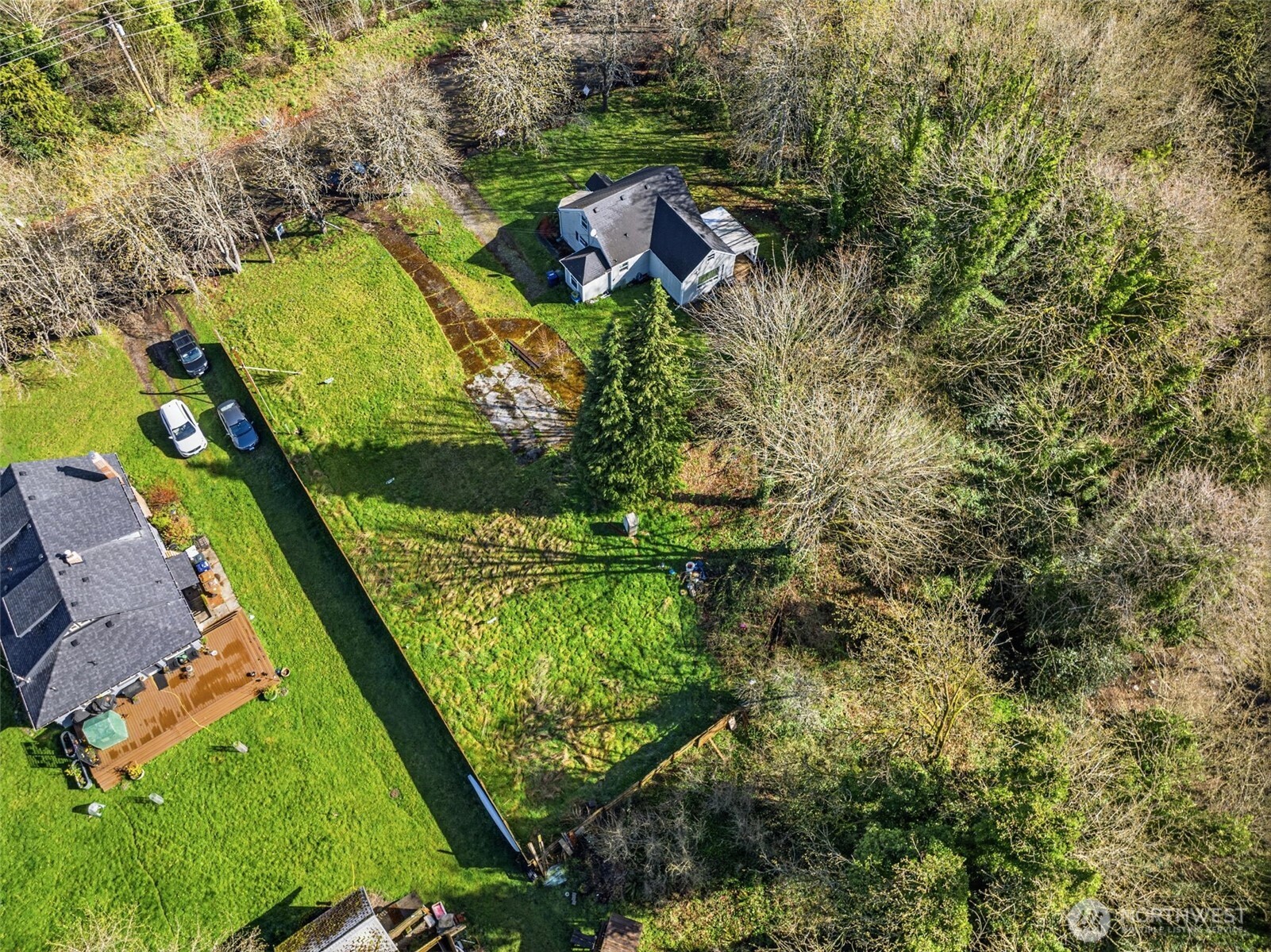 324 East 40th Street Tacoma, WA 98404 - Photo 4 of 17 an aerial view of residential houses with outdoor space